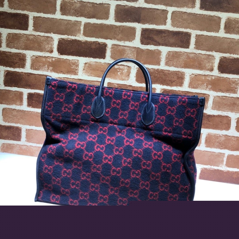 G*u*i shopping bags